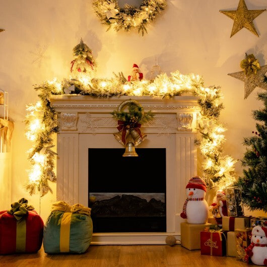 9 Feet Pre-Lit Artificial Christmas Garland with 50 LED Lights - Color: White - Size: 9 ft